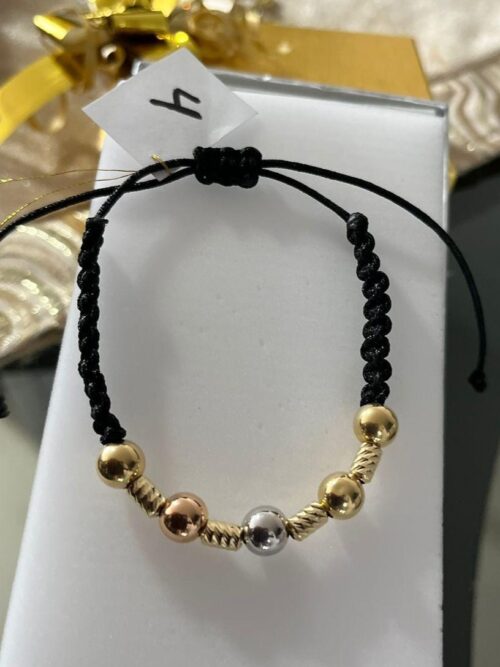 Black Bracelet with Tricolor Gold